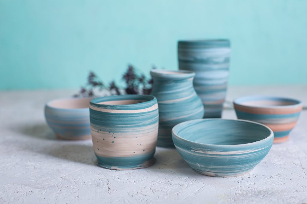 Methods of decorating ceramic products
